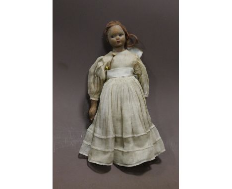 A LATE 19TH CENTURY VINTAGE DOLL IN ORIGINAL DRESS  A/F