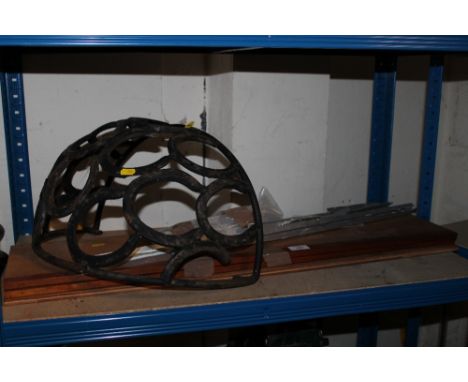 A HORSESHOE WALL MOUNTABLE PLANTER PLUS AN UNASSEMBLED SHELF