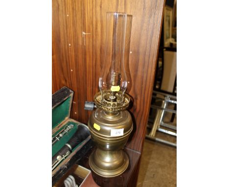 A VINTAGE BRASS LAMP