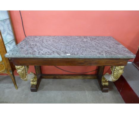 A 19th Century mahogany console table, the rectangular grey marble top above a plain frieze, above sweeping legs carved with 