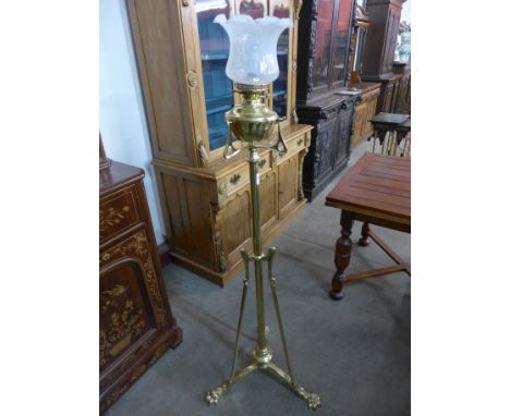 An Art Nouveau brass telescopic standard oil lamp