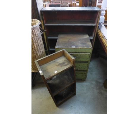 A painted pine bookcase, painted pine chest and a pine shelf