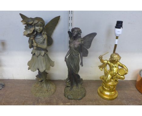 A cherub table lamp and two figural nymphs