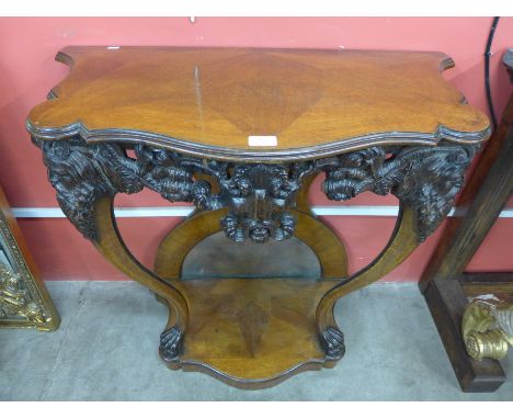 A 19th Century continental Baroque carved oak console table