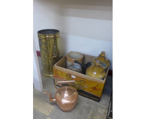 A copper kettle, a brass stick stand and five stoneware jars