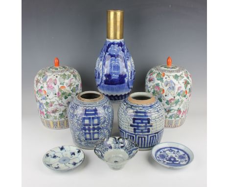 Two Chinese provincial blue and white ginger jars, 19th century, painted with characters and flowers, heights 20cm and 20.5cm