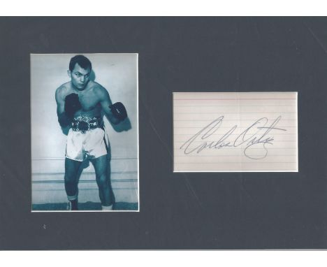 Boxing Carlos Ortiz 12x8 mounted signature piece. Carlos Ortiz (born 9 September 1936) is a Puerto Rican former professional 