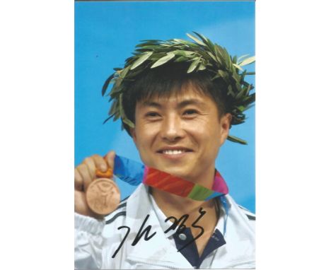 Olympics Kim Jong Su signed 6x4 colour photo of the Bronze medallist in the 50m shooting Event at the 2004 games for North Ko