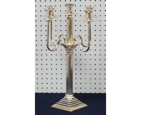 A SILVER PLATE FOUR BRANCH CORINTHIAN  COLUMN CANDELABRA, raised on square stepped base with bead detail, 19" (48 1/4"cm) hig