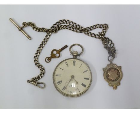 SILVER CASED OPEN FACE POCKET WATCH WITH ENGINE TURNED DECORATION having key wind movement, white Roman dial with seconds sub