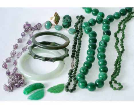 TWO NEPHRITE BEAD NECKLACES, A DYED GREEN HARDSTONE NECKLACE, AN AMETHYST BEAD NECKLACE, THREE GREEN HARDSTONE BANGLES (one a