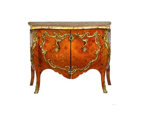 A French gilt metal-mounted Kingwood, bois satiné and end-cut marquetry bombé commode à vantaux, in the Louis XV style, circa