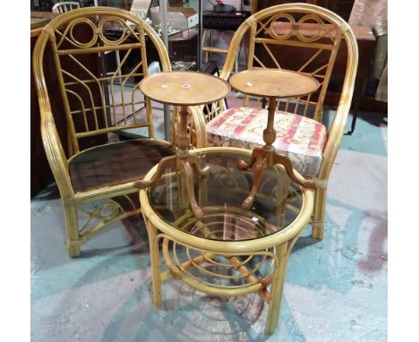 A pair of small tripod tables, pair of bamboo conservatory chairs and a bamboo framed glass topped circular table (5).