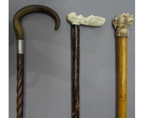 A horn mounted lady's cane, late 19th century, with shepherd's crook handle and partially carved spiral twist hardwood cylind