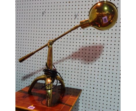 A 20th century brass anglepoise desk lamp with short tripod supports. 