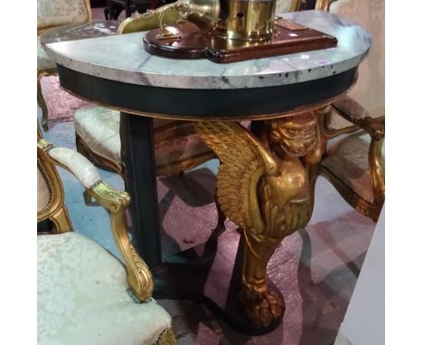 A 20th century console table, the faux marble demi-lune top on a winged lion monopodia support, 87cm x 85cm high.