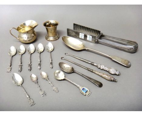 Silver and silver mounted wares, comprising; a milk jug, London 1937, a fiddle pattern tablespoon, London 1856 and a teaspoon