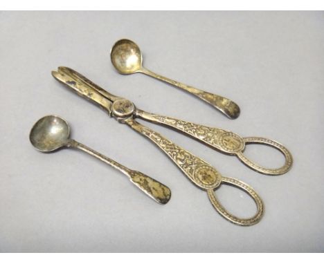 Silver, comprising; a pair of late Victorian grape scissors, having cast decoration, London 1899, an Old English pattern must
