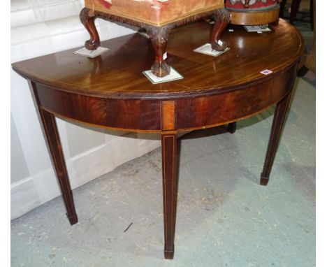 A late George III inlaid mahogany demi-lune console table on tapering square supports, 115cm wide x 72cm high x 60cm deep. 