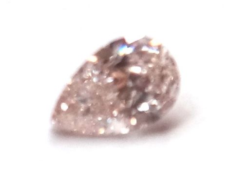A pear-cut loose diamond, 0.52ct., colour M/R range, SI1.This Lot is subject to VAT on the hammer. 