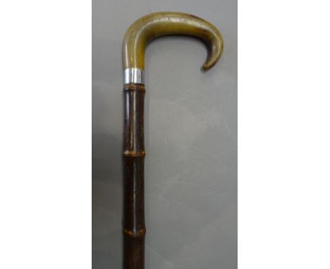 A horn mounted bamboo 'horse measure' walking stick, early 20th century, with internal box wood measuring stick, 95.5cm.