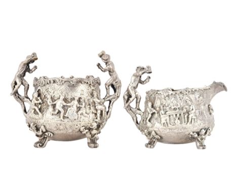 A Victorian silver composite four piece tea and coffee service, decorated in the Teniers revival style, each piece decorated 