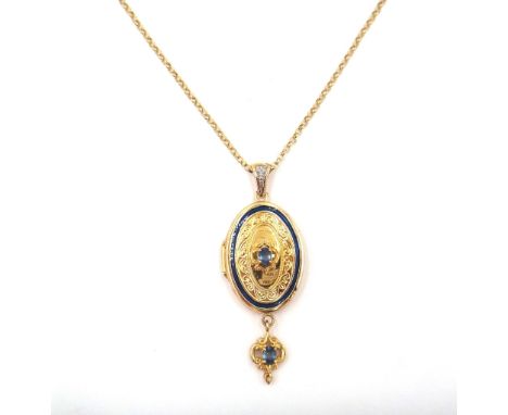 A 14ct gold, sapphire and diamond set oval pendant locket, claw set with an oval cut sapphire to the centre and with an oval 