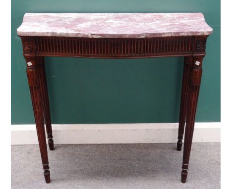 A 19th century console table, the serpentine marble top over a carved mahogany base on tapering fluted supports, 96cm wide x 