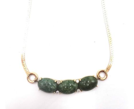 A gold, diamond set and jade necklace, the front mounted with three oval jade cabochons and with two pairs of circular cut di