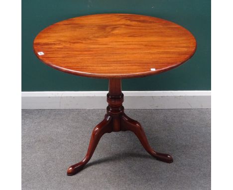 A mid-18th century mahogany occasional table, the circular snap-top on birdcage mount and tripod base, 84cm diameter x 75cm h