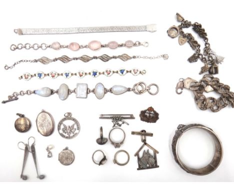 Mostly silver jewellery, comprising; a charm bracelet, an enamelled bracelet, having floral decoration, five further bracelet