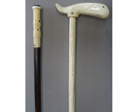 A Victorian whalebone walking stick, the handle caved as a whale (95cm) and an ivory and mother of pearl inlaid hardwood walk