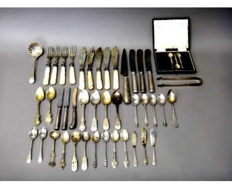 Silver flatware, comprising; an Old English and shell pattern sauce ladle, with engraved decoration, probably London 1792, a 