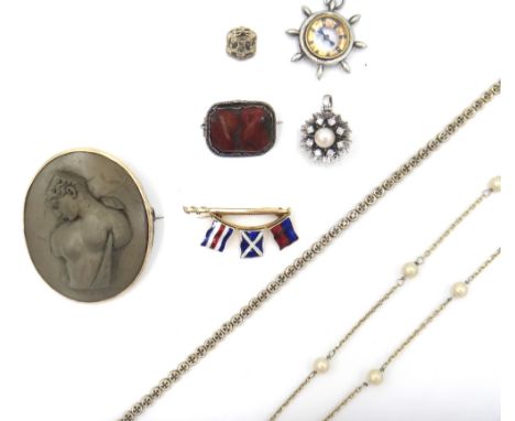 A Benzie 9ct gold and enamelled brooch, designed as three nautical flags and a mast, London 1972, a lava cameo brooch, an aga