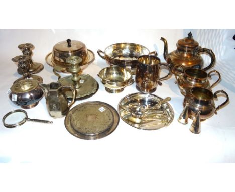 A group of silver plated wares, comprising; a pair of entree dishes, a pair of chamber sticks, an Elkington & Co tea caddy, a