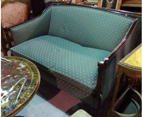 A Regency style mahogany show frame sofa with downswept arms and turned supports, 126cm wide x 85cm high. 