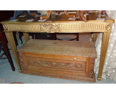 A pair of 18th century style gold painted serpentine top console tables, on tapering square supports, 146cm wide x 93cm high 