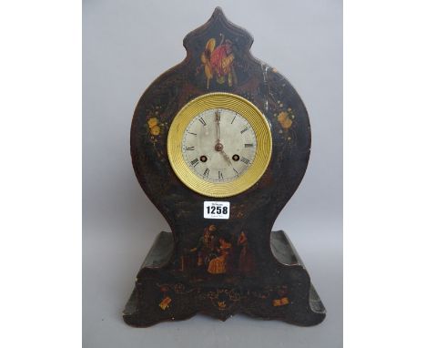 A French polychrome painted wooden cased mantel clock, late 19th century, of waisted form on a spreading base, with two train