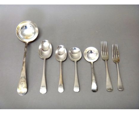 A silver Old English pattern canteen of table flatware for twelve place settings, comprising; twelve dessert spoons, twelve d