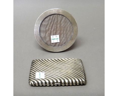 A silver cased rectangular wallet/aide memoire, with spiral banded decoration, the hallmark rubbed and a silver mounted oak c