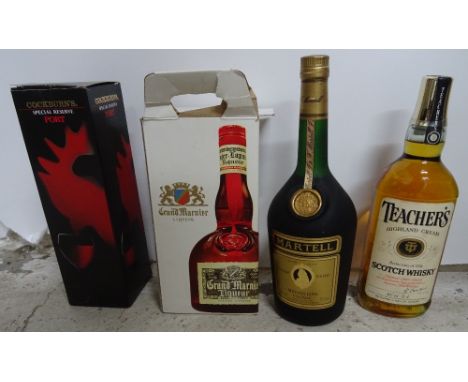 Eleven bottles of whisky, liqueur, cognac and port comprising; (three half bottles); Grants, Haig and Bells, a Dimple whisky,