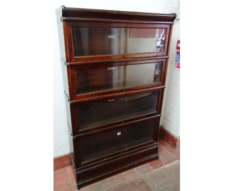 The Globe-Wernicke Co Ltd, a 20th century oak four tier bookcase, 87cm wide.