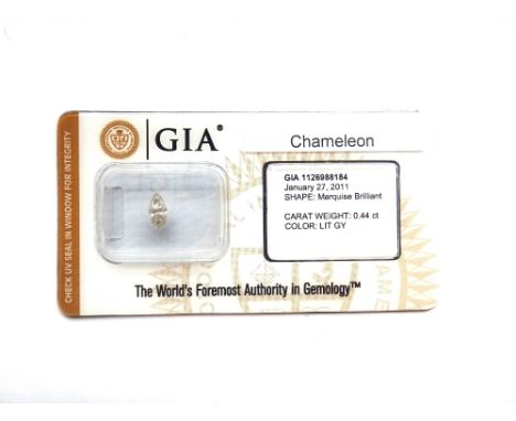 A marquise shaped loose diamond, 0.44cts. in sealed GIA card #126988184 stating 0.44ct, light green yellow, SI3. boxed.This L