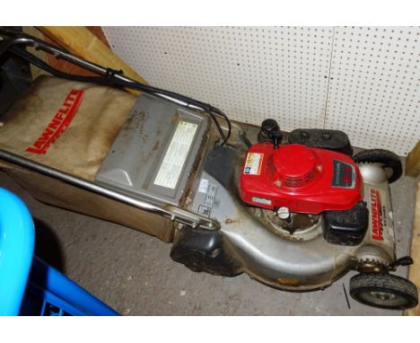  A Lawnflite Pro 553 HRS 21ins cut lawn mower fitted with a 5.5 horsepower Honda engine. 