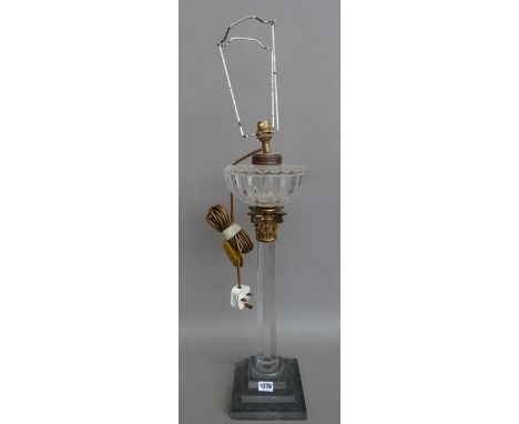 A Victorian glass and gilt metal mounted oil lamp base, (converted to a table lamp) of Corinthian column form, on a stepped s