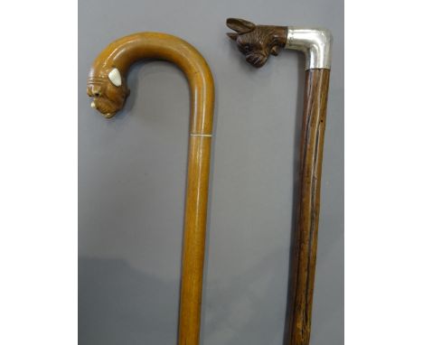 A Black Forest carved wooden 'dog's head' walking stick, circa 1910, with automated mouth and a hallmarked silver collar, Lon