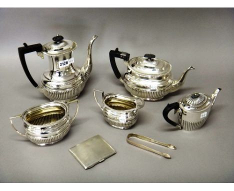 A plated four piece tea and coffee set, comprising; a teapot, a coffee pot, a twin handled sugar bowl and a milk jug, each pi