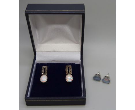 A pair of silver synthetic opal and marcasite earrings and a pair of silver and opal triplet earrings, boxed