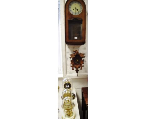 A 1940's Bentima oak cased wallclock; a modern Black Forest style cuckoo clock; a Kundo anniversary clock; two others. (5)