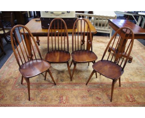 Four Ercol Quaker 365 style dining chairs.